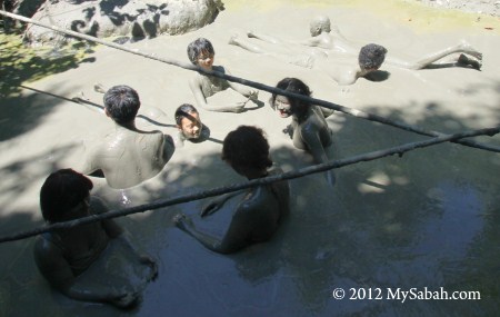 family in mud volcano