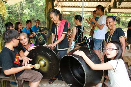 playing gong
