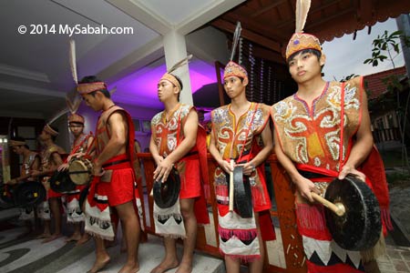 Murut playing gong