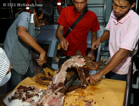 cutting barbecue lamb