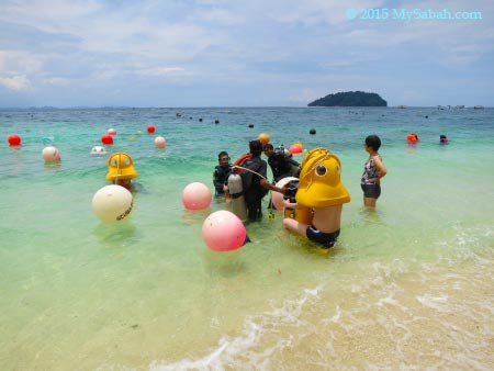 tourists trying Scuba-doo