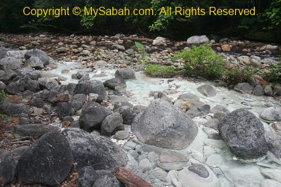 sulphurous spring water flows to river