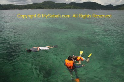 Snorkelling in Usukan Cove Lodge