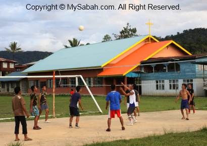 Villagers playing volleyball