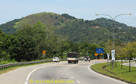 view of Gundul Hill from the road