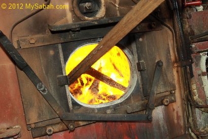 steam engine powered by burning wood