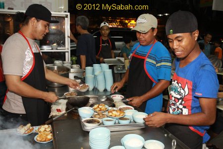 workers preparing Bak Kut Teh