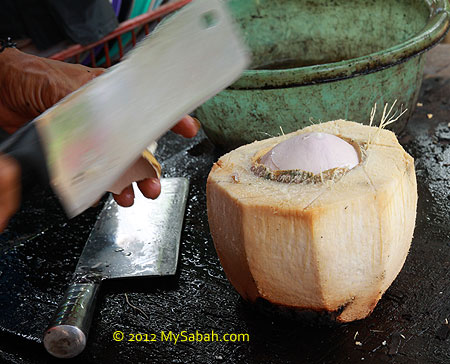 preparing grilled coconut