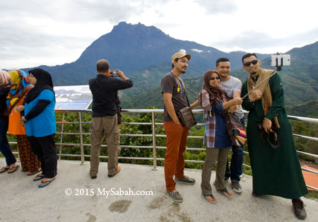 group selfie with Mt. Kinabalu