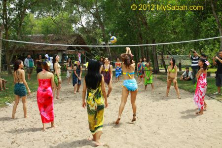 Miss Oriental contestants playing volleyball at Borneo Kelly Bays