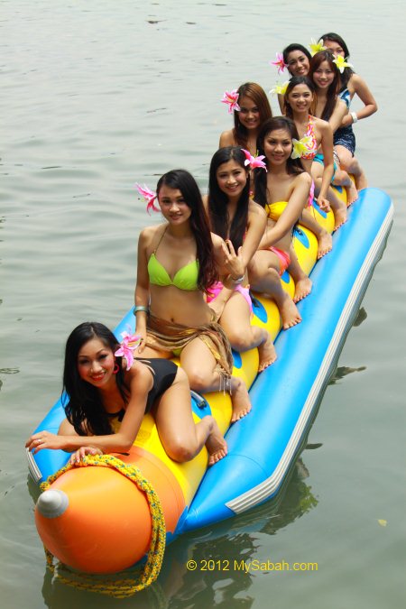 Miss Oriental contestants on banana boat of Borneo Kelly Bays