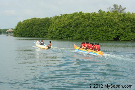 riding banana boat in river