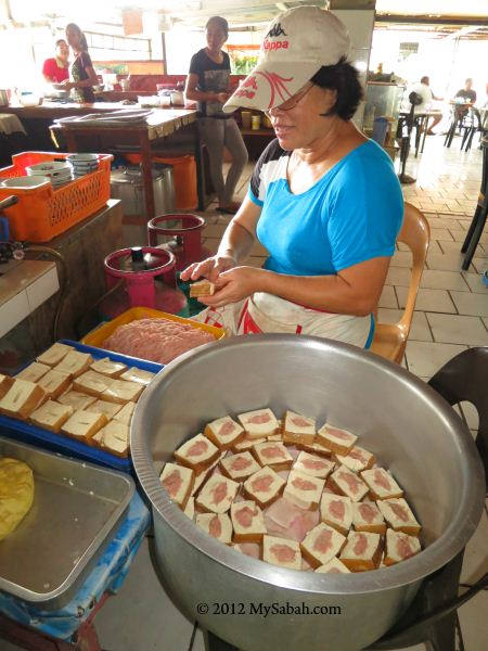 making tofu (bean curd)