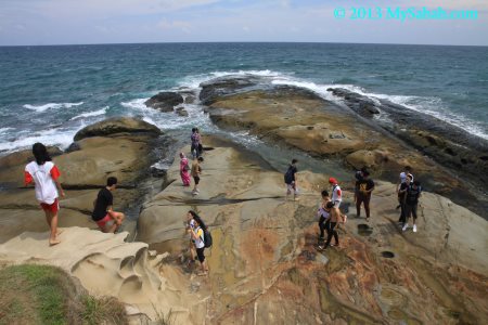 tourists at Tip of Borneo