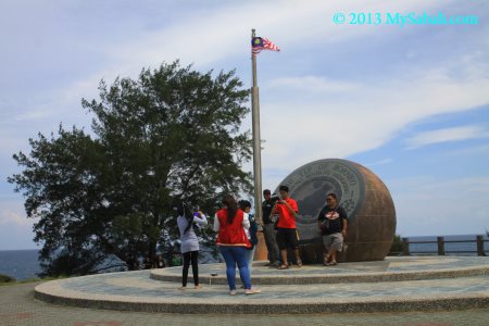 flagpole and globe monument