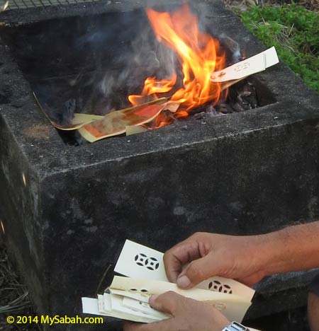 burning paper money