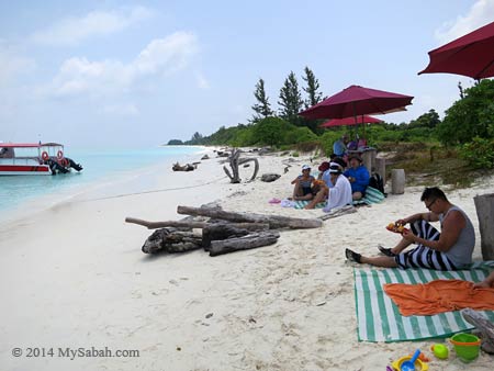 enjoying food at the beach