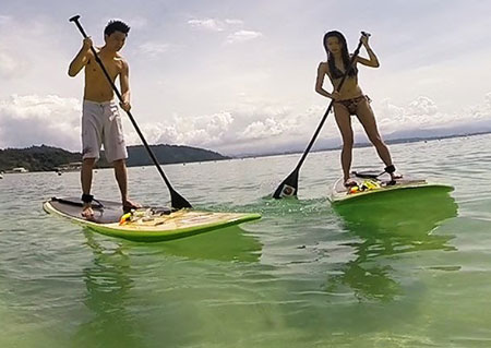 Stand Up Paddle Boarding on the sea of Sabah