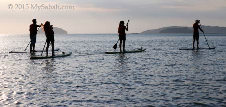 Stand-up paddle-boarding in Tanjung Aru First Beach