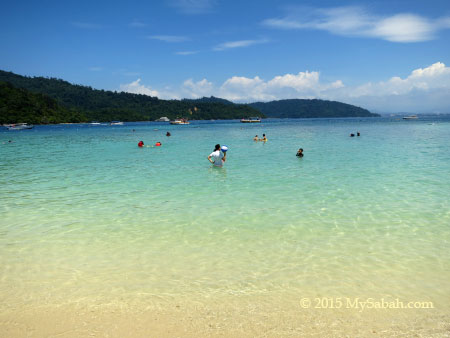 tourists in the sea of Sapi Island