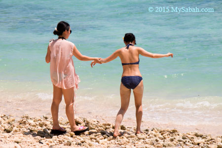 walking on coral beach