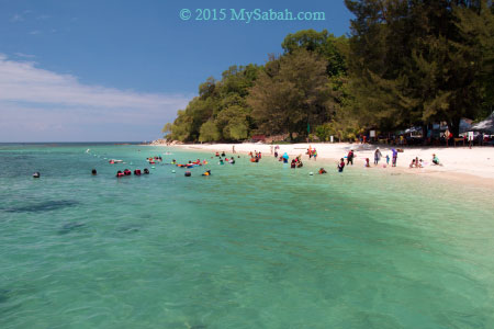 tourists at the beach of Pulau Mamutik