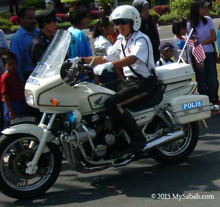 Malaysia traffic police on a bike