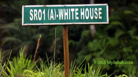 road sign to Whitehouse