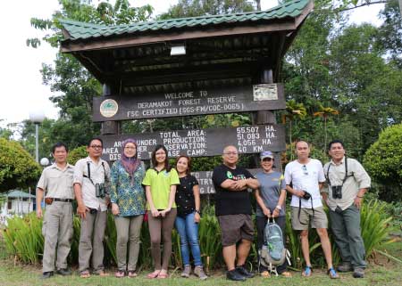 group photo at gate of Deramakot forest reserve