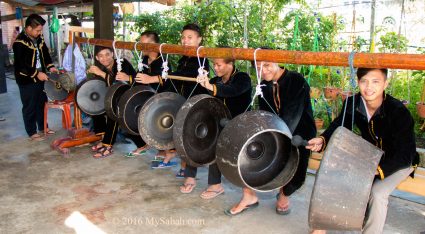 Welcoming gong by villagers