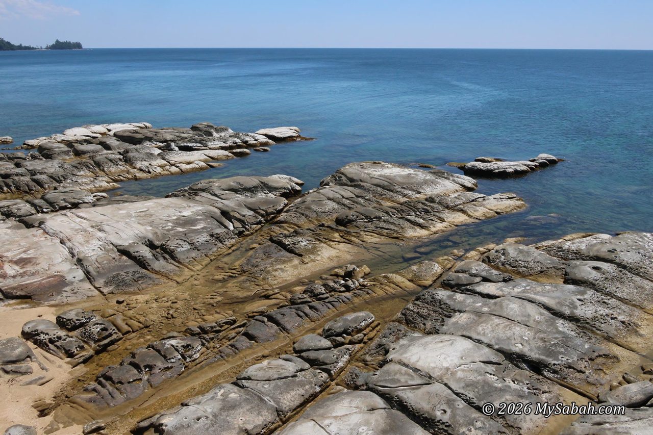 The rocky shore next to the Tip of Borneo