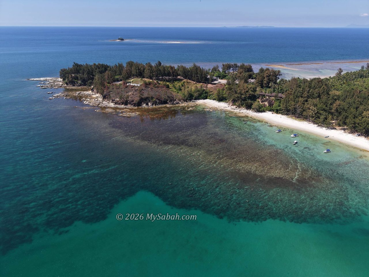 Kalampunian Beach and lighthouse at the Tip of Borneo