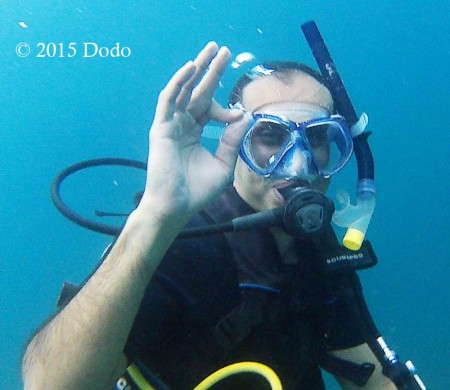 scuba diver showing OK sign