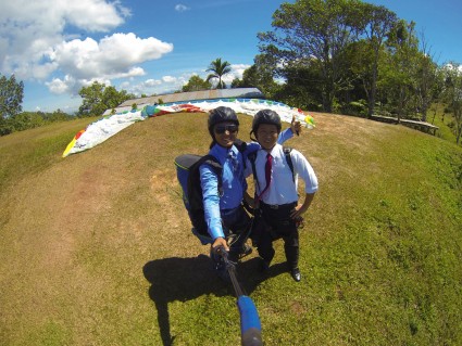 Paragliding in office attire