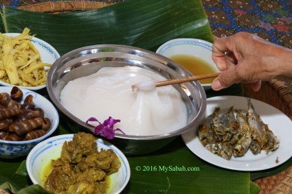 serving ambuyat with traditional dishes