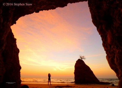 View of Batu Luang rock from inside a cave