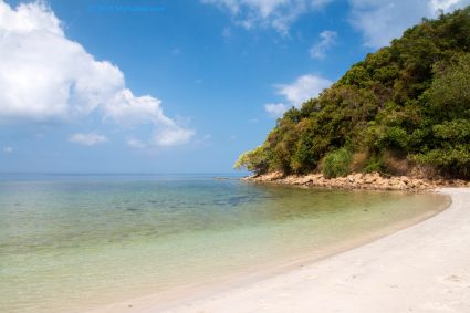 Blue Sky, White Sand and Green Forest at Kelambu Beach