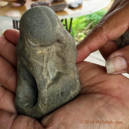 A stone that looks like a Buddha