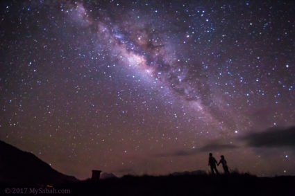 stargazing couple under the starry sky