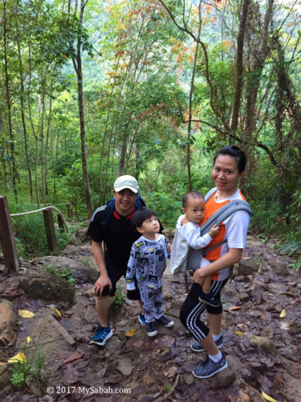 Family climbing Bukit Perahu