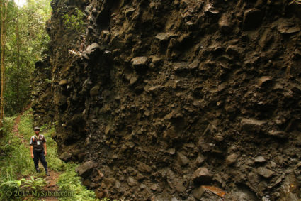 Dark rock wall before the Bat Cave