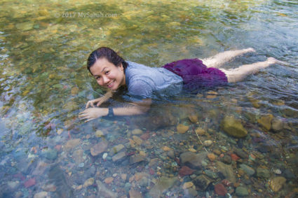 Enjoying the flowing water of river