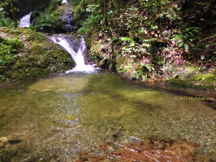 Crystal clear pond of Misumpak Waterfall
