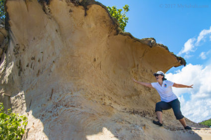 Surfing under wave-like wall of Batu Talam