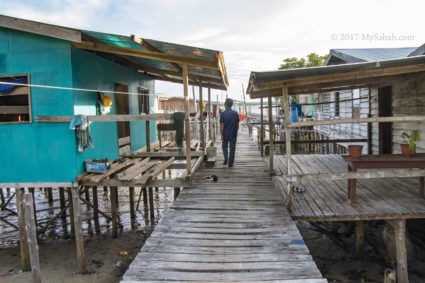 Visit the water village of Kampung Pansuran