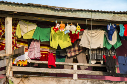 A house with colorful hanging clothes in Malubang