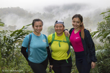 group photo with misty forest as background