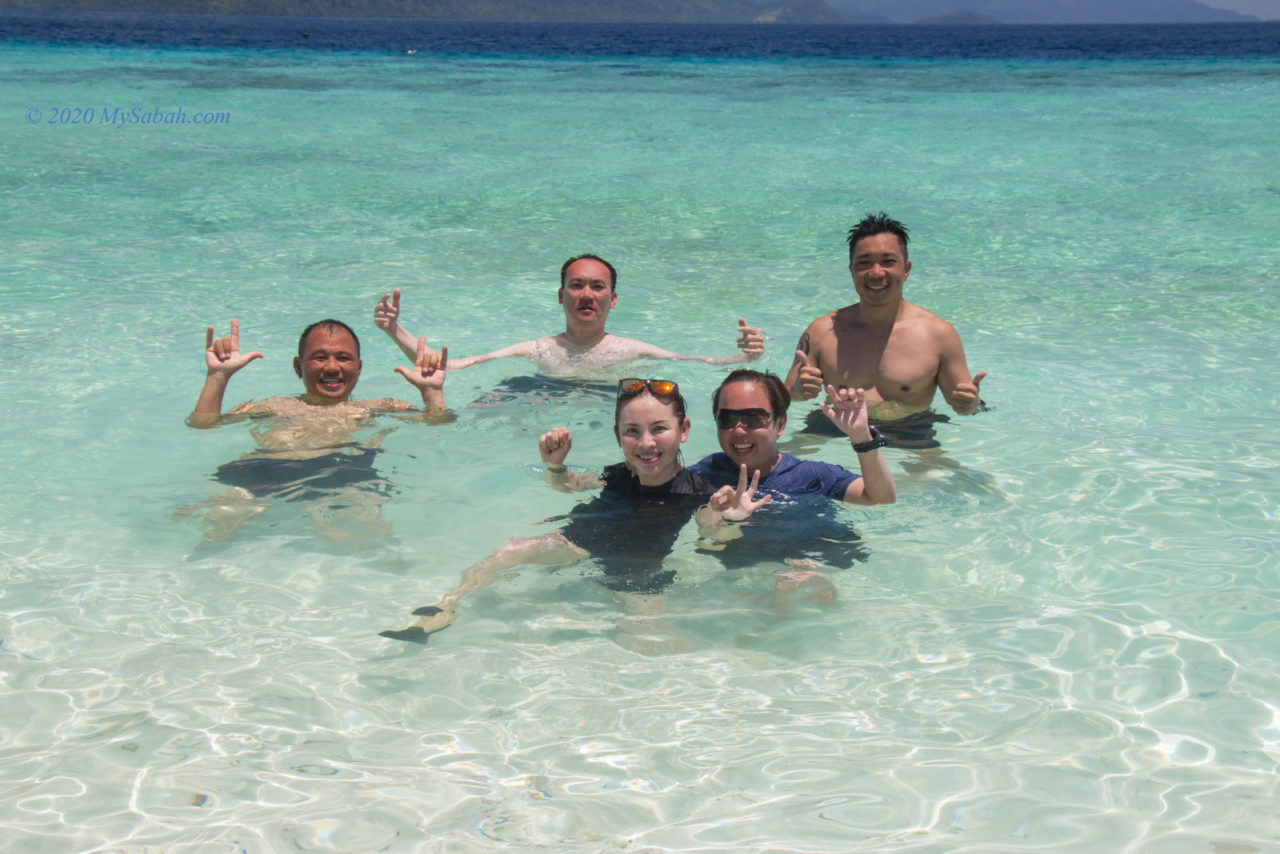 Group photo in the clear water