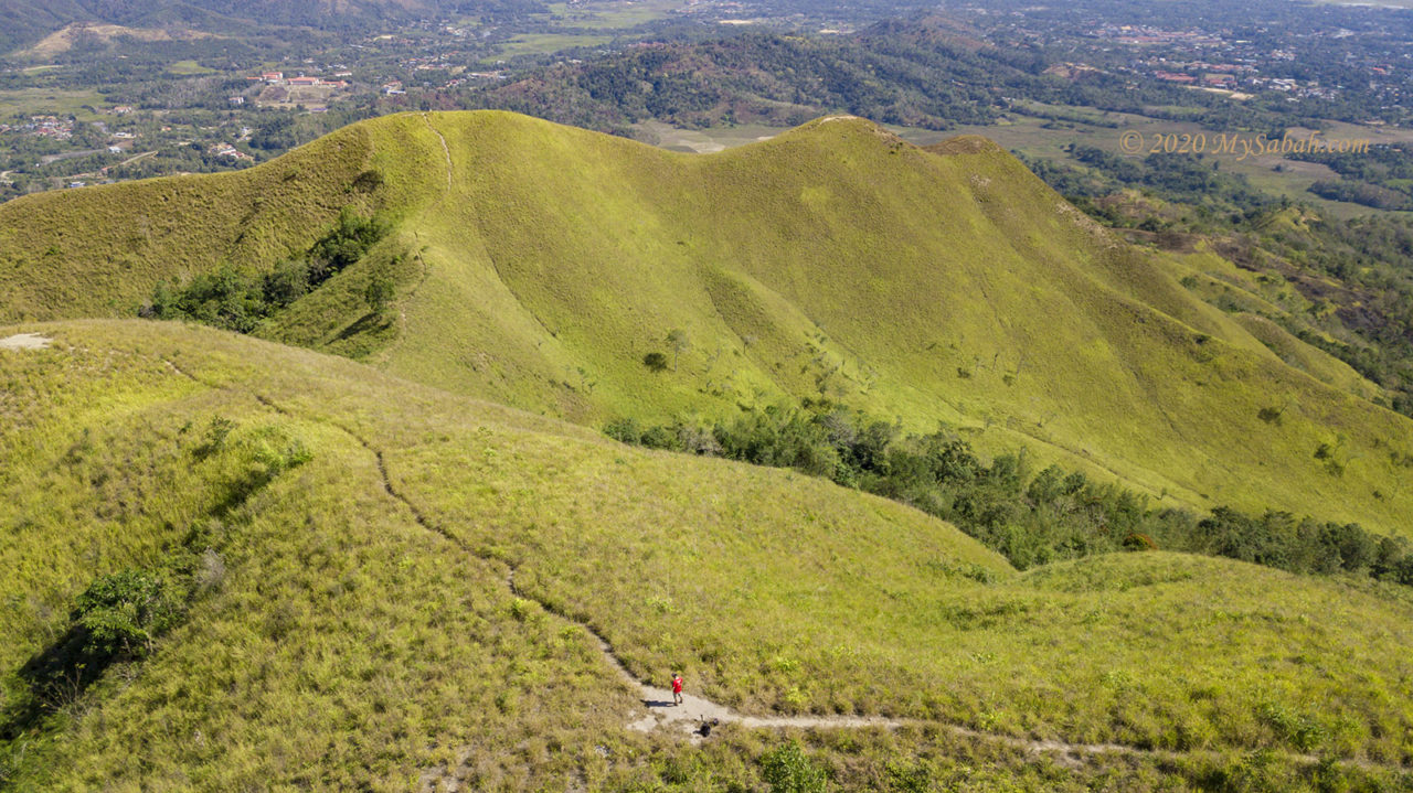 Flying drone on the highest peak of Bukit Bongol