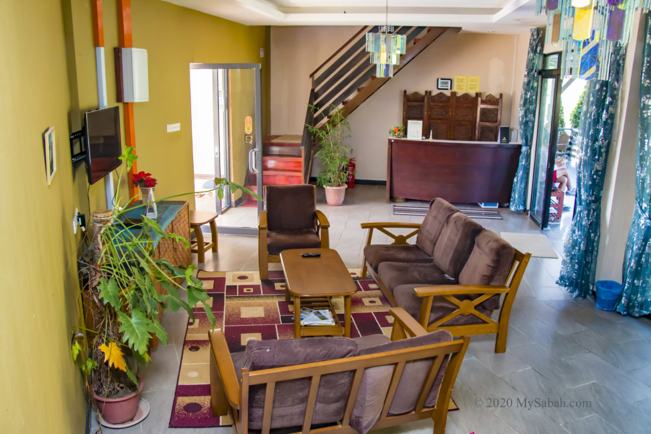 Check-in counter and living room in ground floor